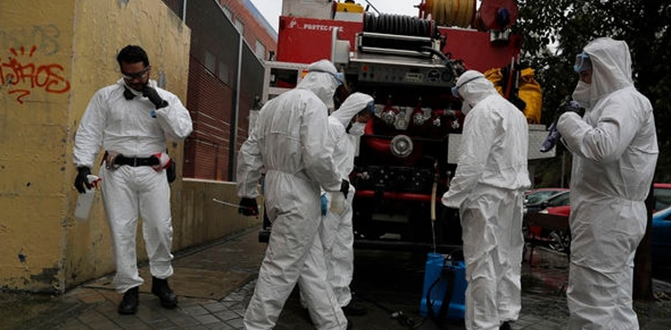 Spain sees record 849 virus deaths but downward trend