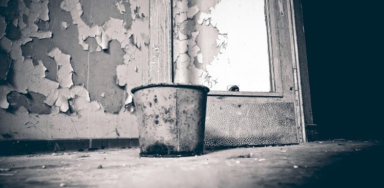 Couple submerges three-week-old baby in bucket of tar