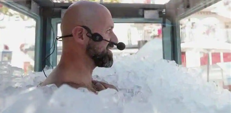 Man breaks world record for standing in box of ice