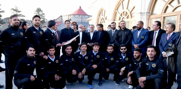 Afghanistan cricket team presents signed bat to PM Imran Khan