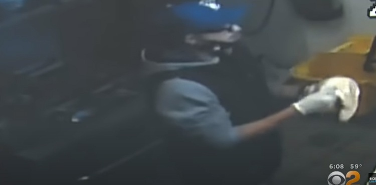 Security cam shows burglar making pizza while robbing store