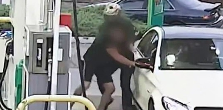 Criminals snatch car after threatening driver with knife at petrol station