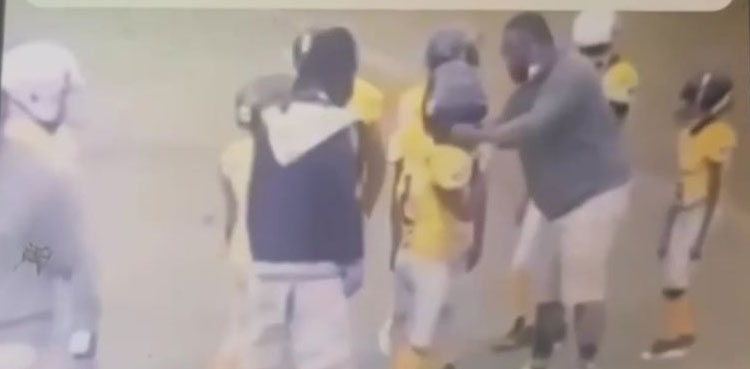 Watch: Youth football coach hits player multiple times during match
