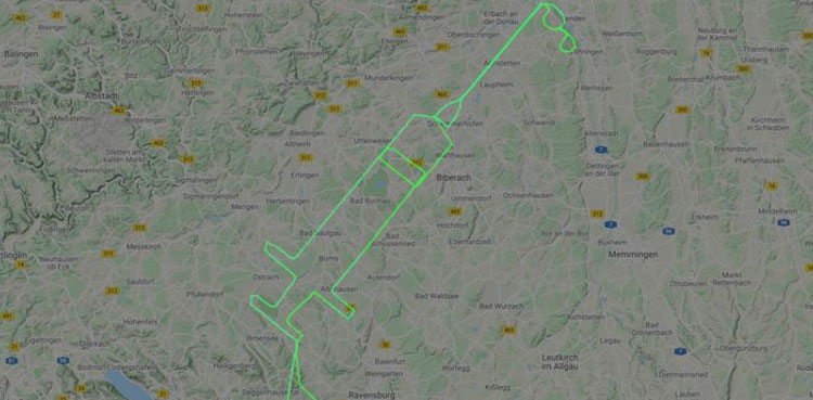 German pilot makes point with syringe in the sky