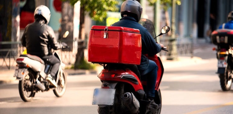 Food delivery rider breaks into tears as robbers looted his valuables