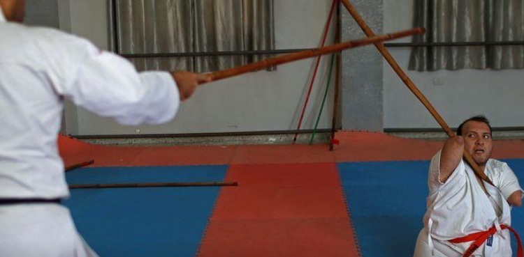 Palestinian man with disabilities conquers karate