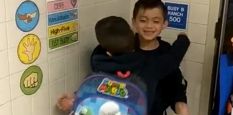 Teacher whose video of kids hugging went viral dies of COVID-19