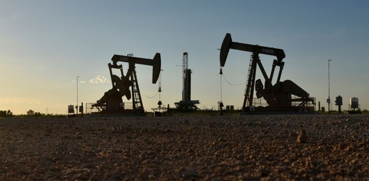 Oil prices climb as deep freeze shuts US oil wells, curbs refineries