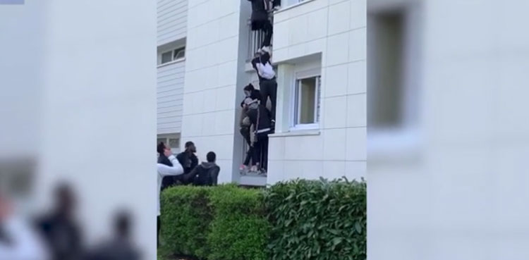 VIDEO: Six-month-old baby survives after being thrown from burning building