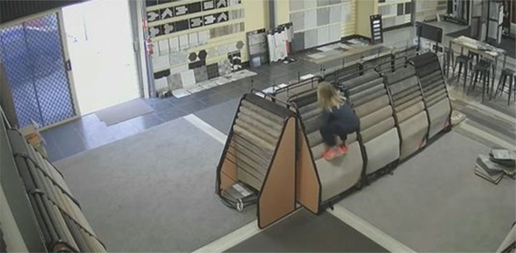 Chilling footage shows seven-year-old girl playing in the back of a shop moments before she is crushed by a 90kg tyre