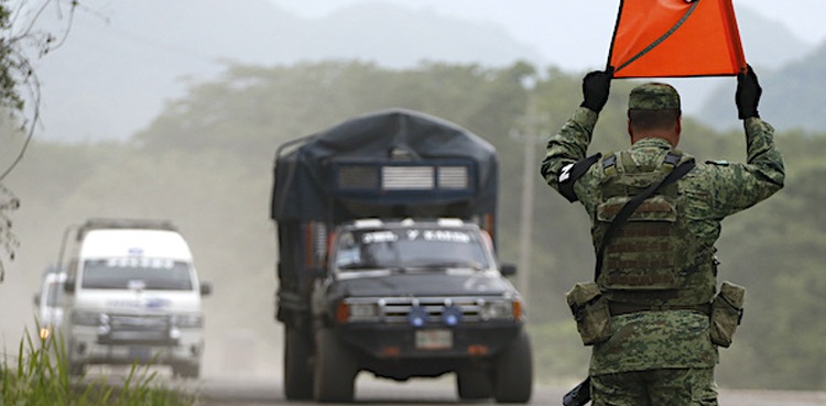 Mexico authorities find 129 migrants packed in cargo truck