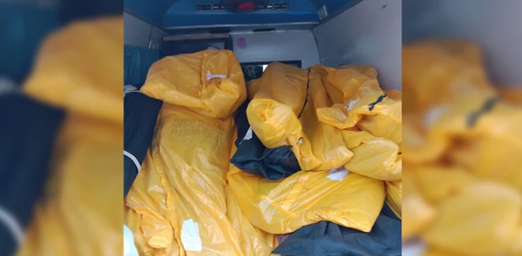 COVID Carnage: Indian district stuffs van with 22 bodies amid ambulance shortage