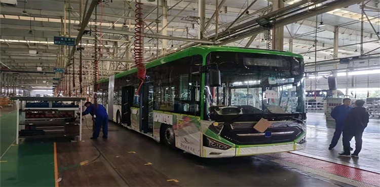 Prototype bus for Karachi Green Line ready in China, Asad Umar says