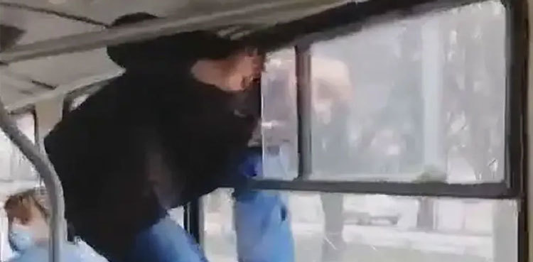 VIDEO: Man climbs out of tram window to avoid paying fare