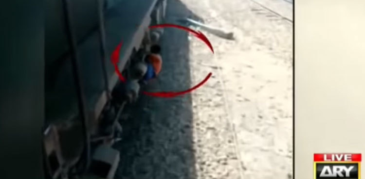 Video: Sukkur boy risks life to steal from moving train