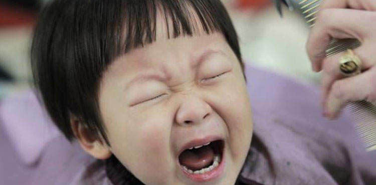 Chinese boy, 10, calls police after getting angry with barber over bad haircut
