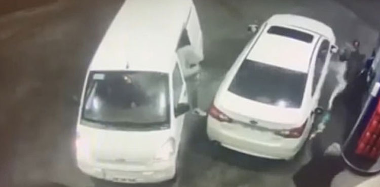 Video: Motorist sprays 'thieves' with petrol to thwart robbery