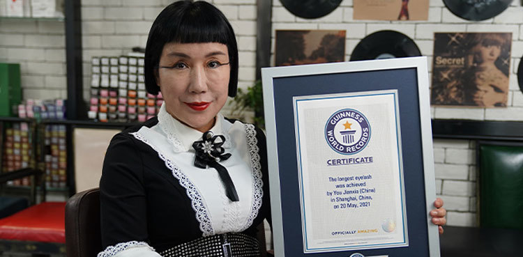 Woman with world’s longest eyelash breaks own record