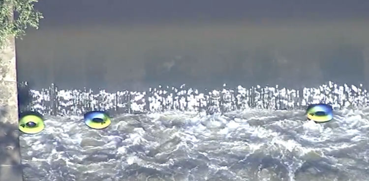Three tubers die, two missing after going over dam in US
