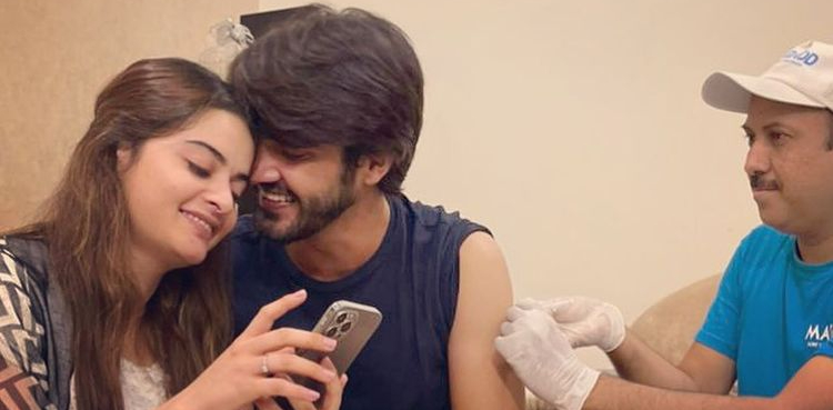 Ahsan Mohsin Ikram gets vaccinated with Minal Khan for support