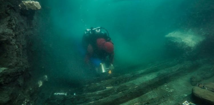 Egypt finds ancient military vessel, Greek graves in sunken city