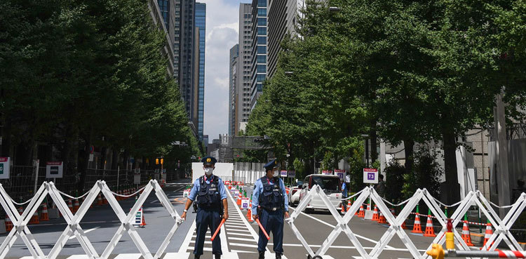 Japan expands state of emergency as COVID-19 surge shadows Olympics