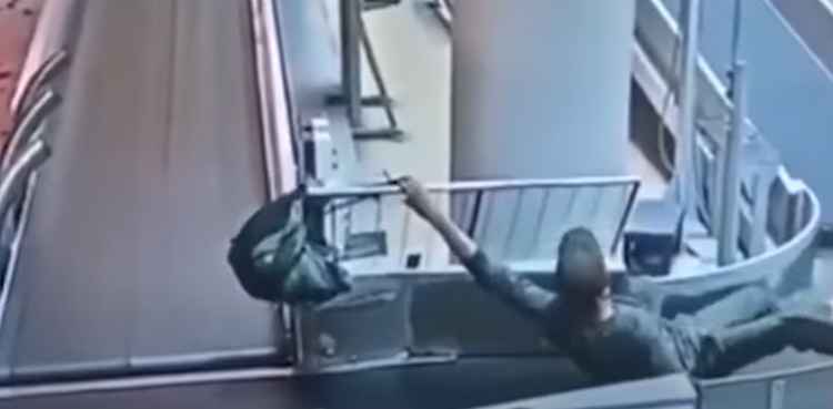 Viral video: Man goes on unexpected conveyor belt ride at airport