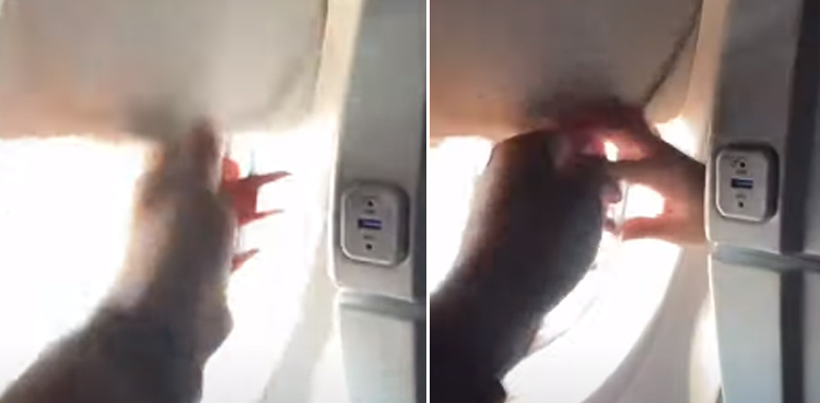Man, woman fight over window blind during flight, video goes viral