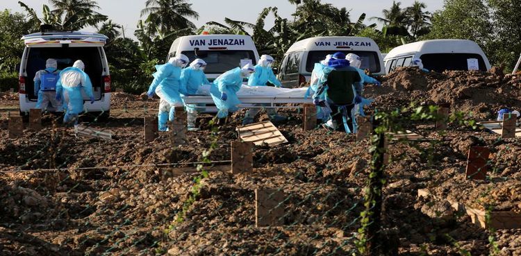 Malaysia posts record monthly COVID-19 deaths as authorities cite backlog