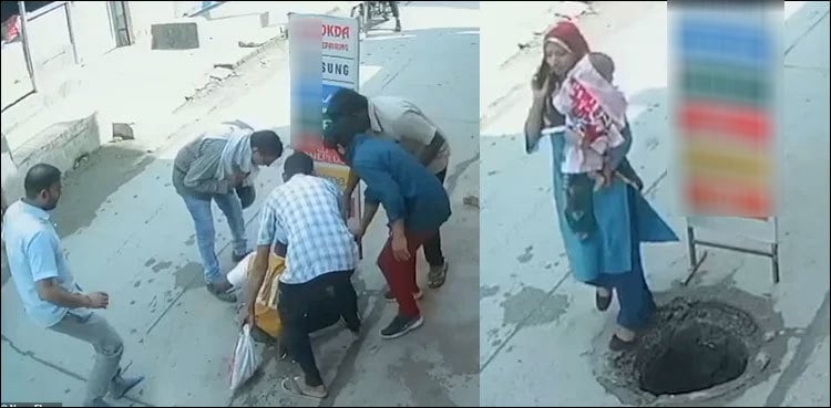 WATCH: Mother falls into manhole with baby while talking on mobile phone