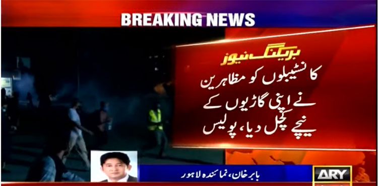 Two policemen crushed to death by Lahore protesters