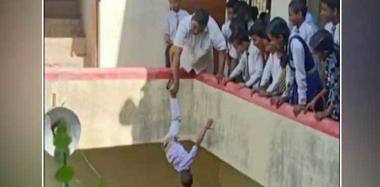 India: School principal hangs student upside from building
