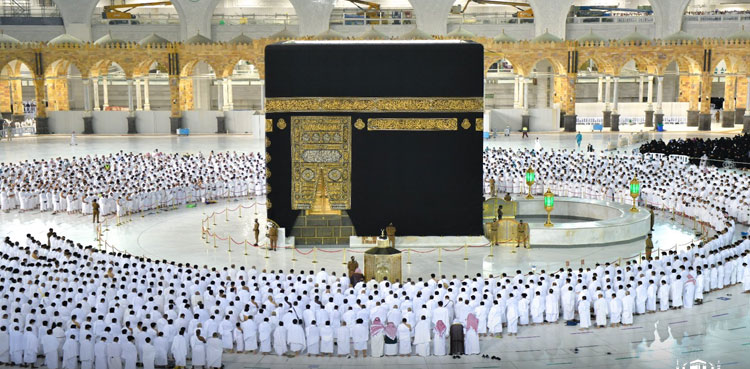 In pictures: Worshippers pray shoulder-to-shoulder in Makkah, Madina