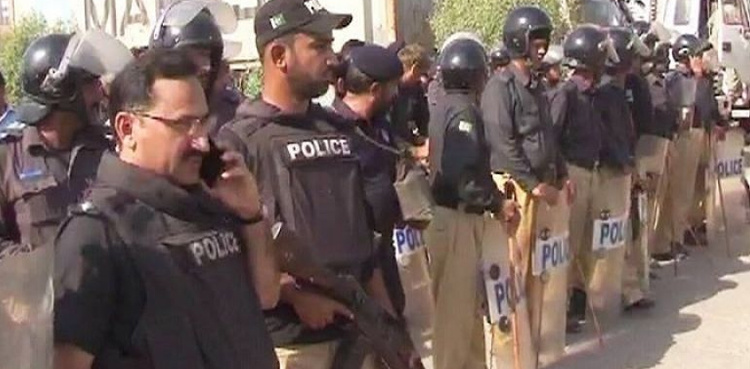 Police baton charge protesting vaccinators in Karachi