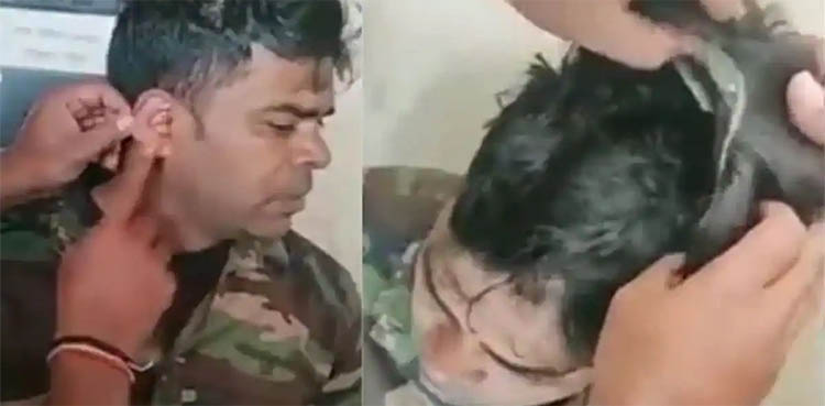 Video: Man using wig, Bluetooth to cheat during exam gets caught   