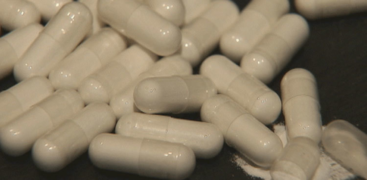 Two held after recovery of heroin capsules in Karachi