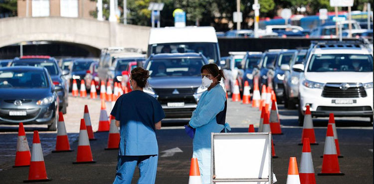 Australia suffers deadliest day of pandemic as Omicron drives up hospital cases