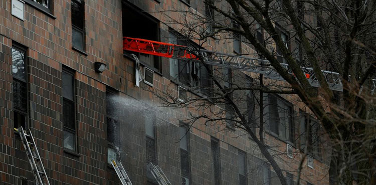 New York apartment fire kills 19, including 9 children