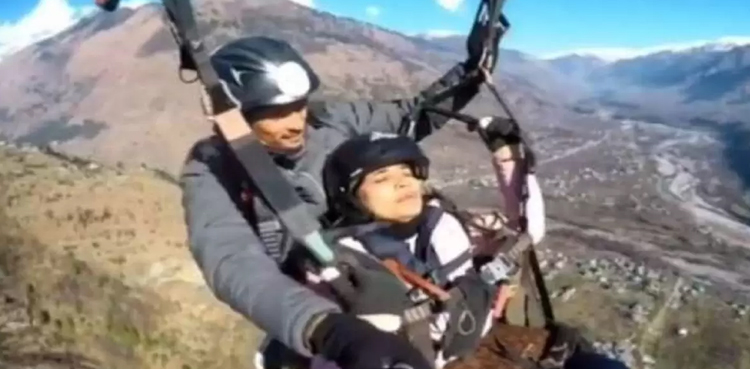 Woman breaks the internet with viral paragliding video