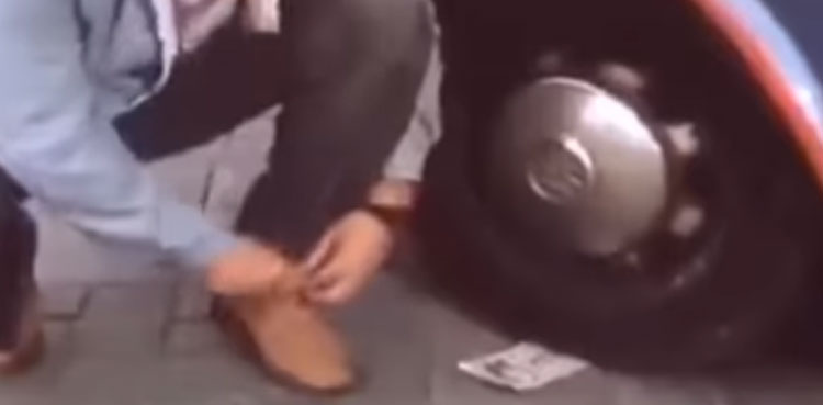 Hilarious video of currency note stuck under car tyre goes viral