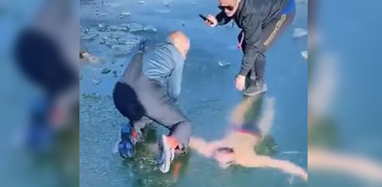 Watch: Man swims under frozen lake, gets 'disorientated'