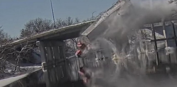 WATCH: Trailer plunge off Massachusetts bridge into icy river
