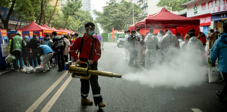 China: hospitals, funeral homes 'busy' as COVID spreads unchecked