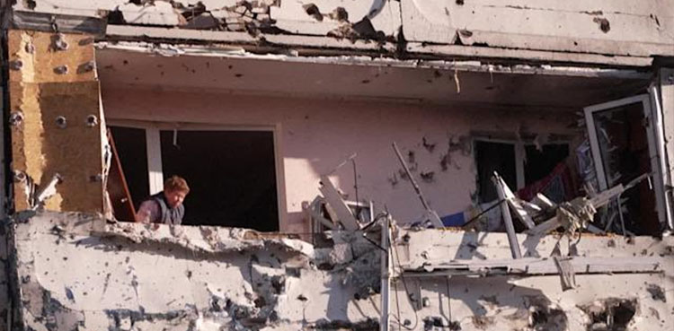 Russian forces press in on Kyiv as curfew begins