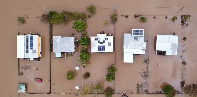 In Pictures: Tens of thousands evacuate as floods hit East Australia