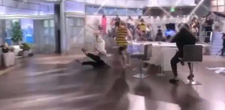 Viral video: TV show host falls in front of audience