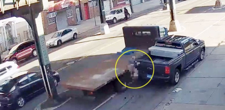 Horrific: Pedestrian crushed between stolen flatbed truck and his car