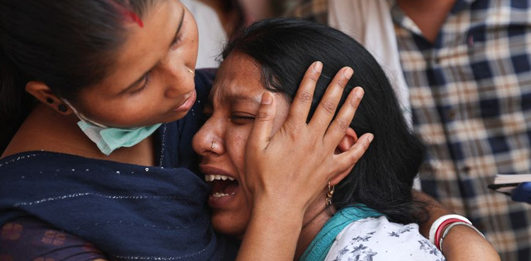 Building fire kills 27 in New Delhi, police arrest company owners