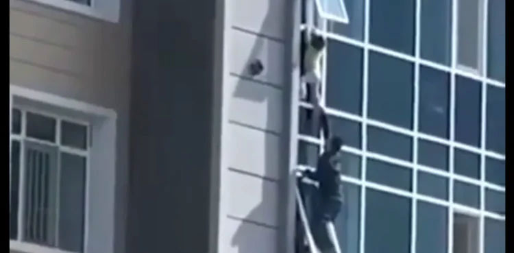 Viral: Kazakistan man saves toddler hanging from eighth-floor window