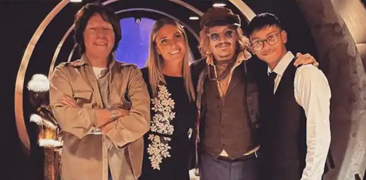 Johnny Depp celebrates win over Amber Heard at restaurant